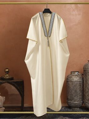 Elegant Cream Kaftan with Gold trim and Keffiyeh design